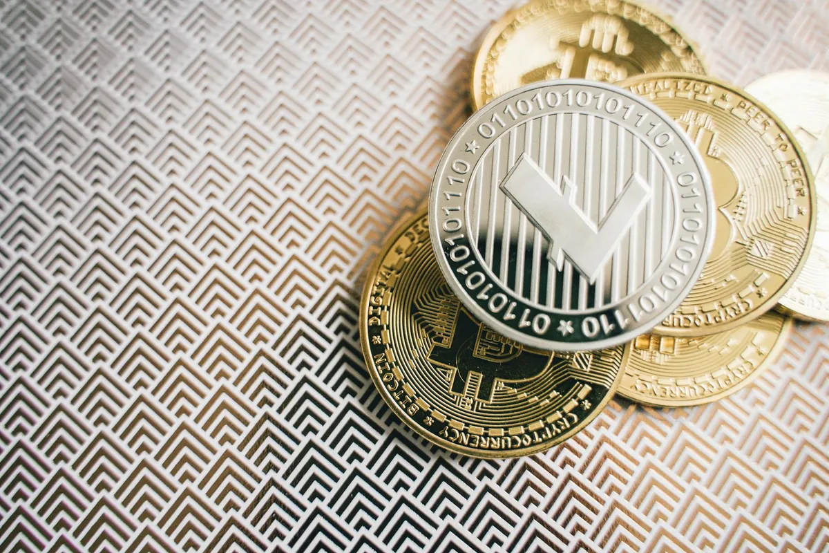 Golden Bitcoin coin on dark background